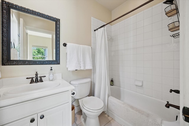 bathroom featuring toilet, shower / tub combo, vanity, and tile patterned floors