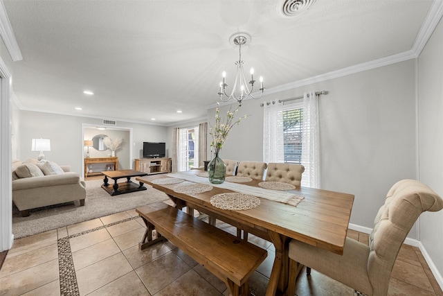 dining space featuring a chandelier, light tile patterned floors, visible vents, and crown molding