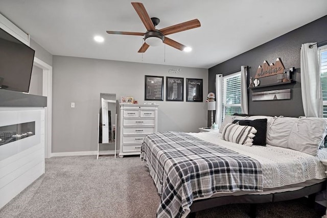bedroom with baseboards, a ceiling fan, carpet, and recessed lighting