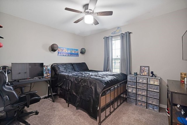 carpeted bedroom featuring ceiling fan and baseboards