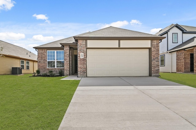 view of front of property featuring a garage, central AC, a front yard, brick siding, and driveway