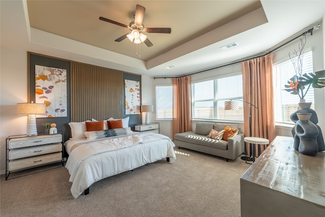 5045 Cervinae Rd, Fort Worth, TX 76036 - bedroom featuring a raised ceiling, carpet flooring, and ceiling fan