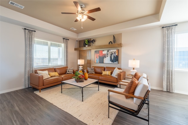 5045 Cervinae Rd, Fort Worth, TX 76036 - living area featuring wood finished floors, healthy amount of natural light, a ceiling fan, and baseboards
