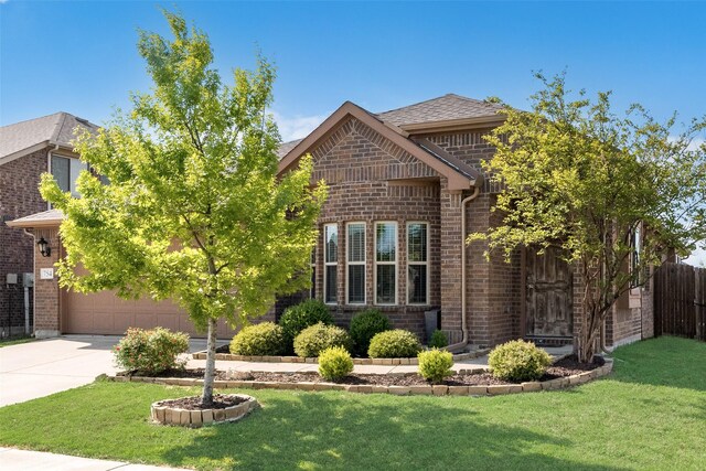 754 Brookline Dr, Lavon, TX 75166 - view of front of house featuring brick siding and concrete driveway