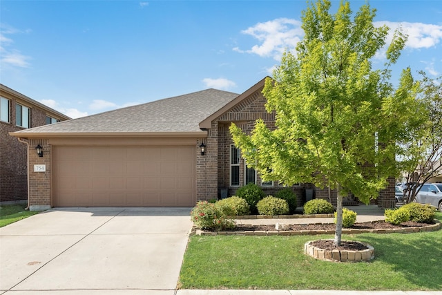 754 Brookline Dr, Lavon, TX 75166 - view of front of house with brick siding, driveway, an attached garage, and a front yard