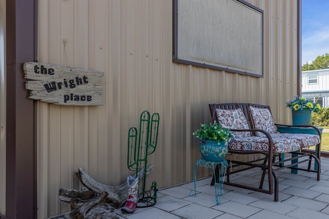 property entrance with a patio area
