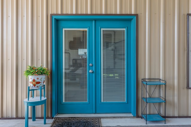 property entrance featuring french doors