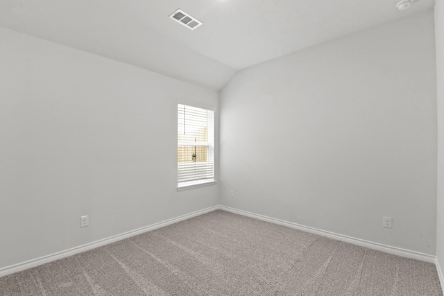 5024 Wellborn Rd, Fort Worth, TX 76036 - carpeted empty room featuring vaulted ceiling, visible vents, and baseboards