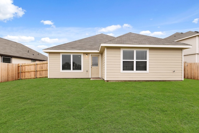 5024 Wellborn Rd, Fort Worth, TX 76036 - rear view of property featuring a yard, roof with shingles, and a fenced backyard