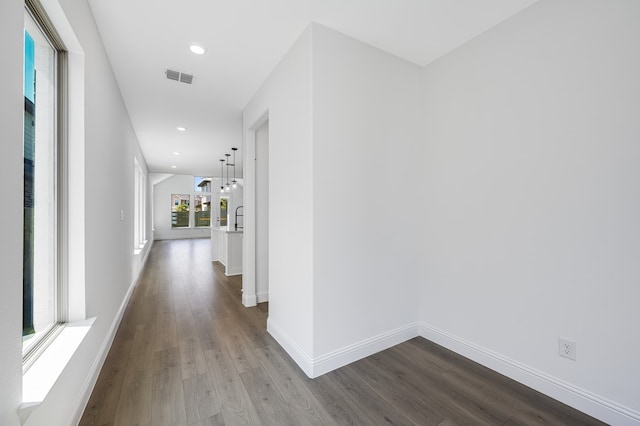 1538 Ginger Ln, Argyle, TX 76226 - hallway with dark wood-type flooring, baseboards, and recessed lighting