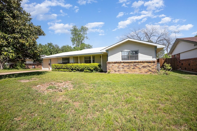 1128 Mason Dr, Hurst, TX 76053 - view of front of property featuring a front yard, brick siding, fence, and an attached garage