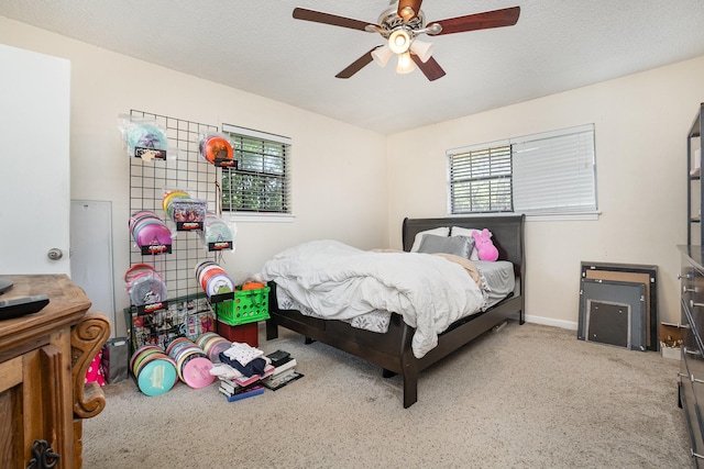 1128 Mason Dr, Hurst, TX 76053 - carpeted bedroom featuring multiple windows and a ceiling fan