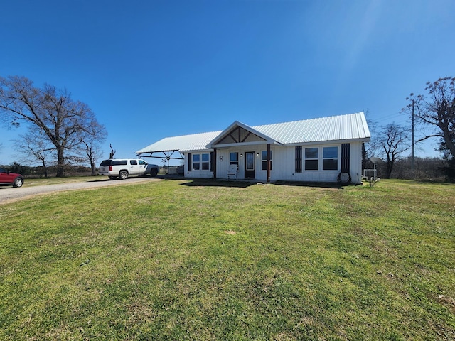 407 County Road 3204, Quitman, TX 75783 - single story home featuring metal roof, a front yard, and driveway