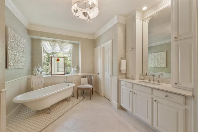 3604 Post Oak Trl, Corinth, TX 76210 - bathroom featuring crown molding, a freestanding bath, a chandelier, vanity, and marble finish flooring