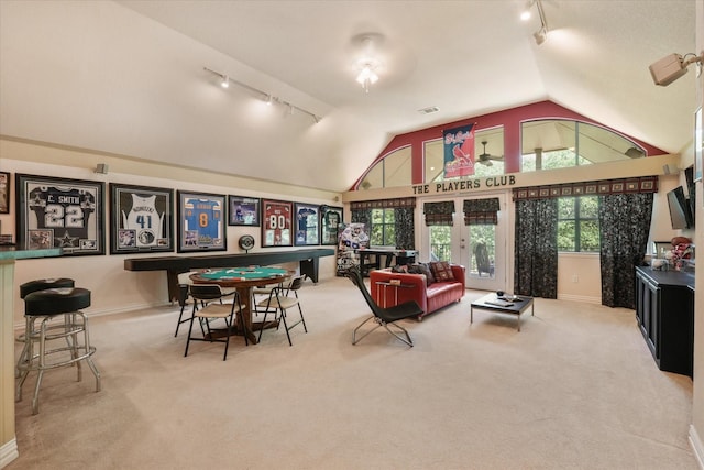 3604 Post Oak Trl, Corinth, TX 76210 - rec room featuring track lighting, vaulted ceiling, carpet flooring, french doors, and baseboards