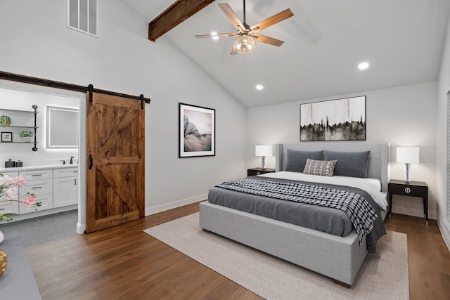 bedroom featuring recessed lighting, beam ceiling, a barn door, visible vents, and dark wood finished floors