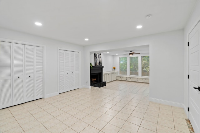 2204 Wood Cliff Ct, Arlington, TX 76012 - unfurnished living room with recessed lighting, a ceiling fan, a fireplace with raised hearth, baseboards, and light tile patterned floors