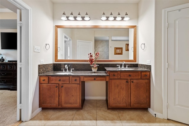 10908 County Road 442, Princeton, TX 75407 - full bathroom with tile patterned floors, double vanity, and a sink