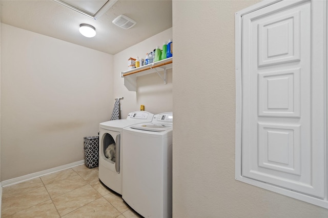 10908 County Road 442, Princeton, TX 75407 - laundry room featuring visible vents, baseboards, light tile patterned floors, laundry area, and independent washer and dryer