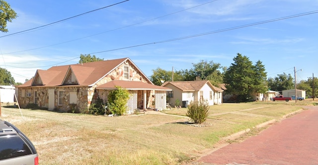 view of front of home with a front yard