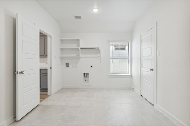 interior space featuring visible vents, laundry area, gas dryer hookup, hookup for an electric dryer, and hookup for a washing machine