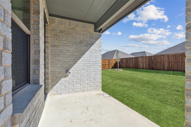 view of yard with a patio area and fence