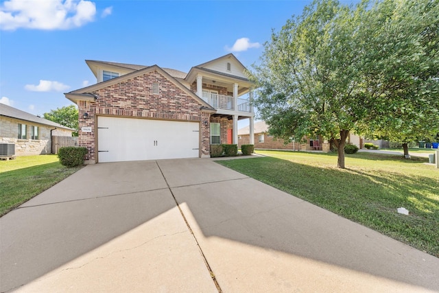 view of front of property featuring a front yard, brick siding, a garage, and concrete driveway