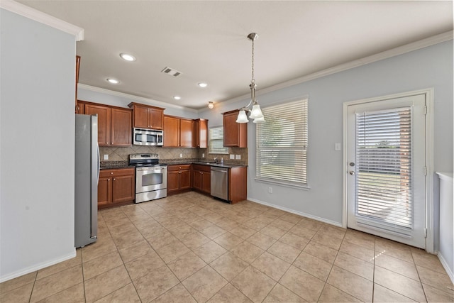 kitchen featuring light tile patterned floors, decorative backsplash, ornamental molding, and appliances with stainless steel finishes