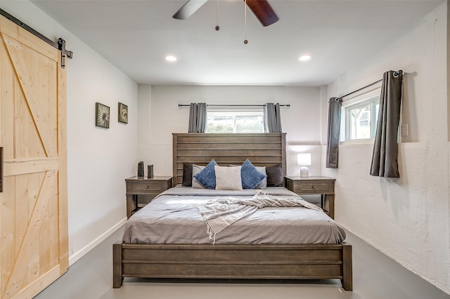 2520 Long Creek Ct, Granbury, TX 76049 - bedroom featuring recessed lighting, a barn door, and multiple windows