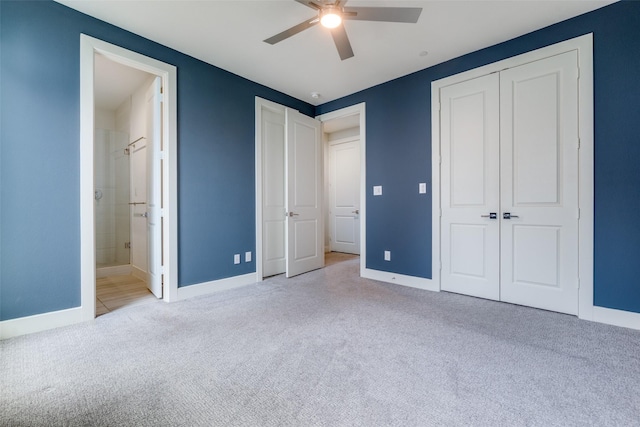 5707 Lindell Ave Unit 204, Dallas, TX 75206 - unfurnished bedroom featuring carpet floors, baseboards, a ceiling fan, and ensuite bathroom