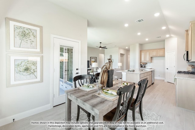 dining room with a ceiling fan, visible vents, recessed lighting, light wood finished floors, and baseboards