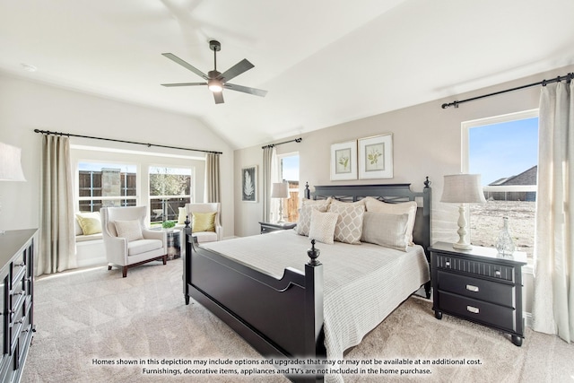 bedroom featuring ceiling fan, lofted ceiling, and carpet