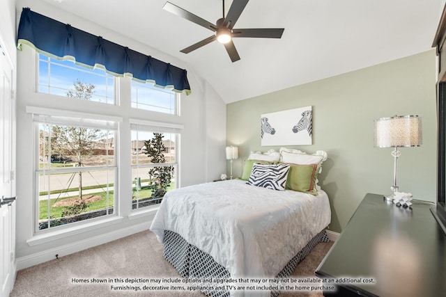 carpeted bedroom featuring baseboards, vaulted ceiling, and ceiling fan