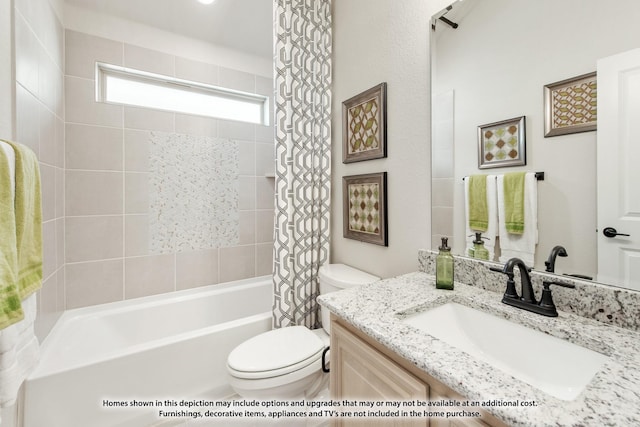 bathroom with shower / bathtub combination with curtain, vanity, and toilet