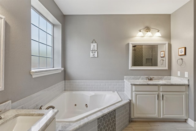 2605 Owl Creek Dr, Plano, TX 75025 - bathroom with a jetted tub and vanity