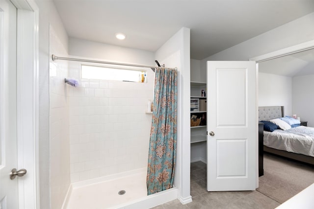 9449 Firedog Dr, Fort Worth, TX 76131 - ensuite bathroom with a stall shower and tile patterned flooring