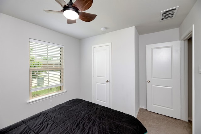 9449 Firedog Dr, Fort Worth, TX 76131 - unfurnished bedroom with multiple windows, dark carpet, and ceiling fan
