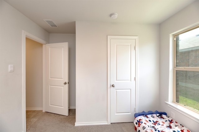 9449 Firedog Dr, Fort Worth, TX 76131 - unfurnished bedroom featuring light carpet