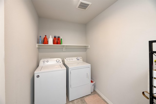 9449 Firedog Dr, Fort Worth, TX 76131 - laundry area featuring washing machine and dryer and baseboards