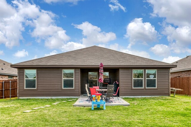 9449 Firedog Dr, Fort Worth, TX 76131 - rear view of house with a fenced backyard, a patio, and roof with shingles