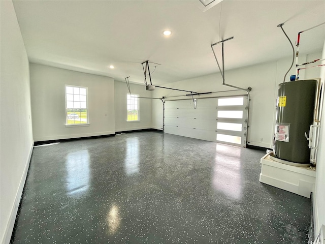 garage featuring electric water heater, baseboards, recessed lighting, and a garage door opener