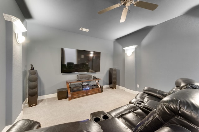 cinema with visible vents, baseboards, carpet floors, and ceiling fan