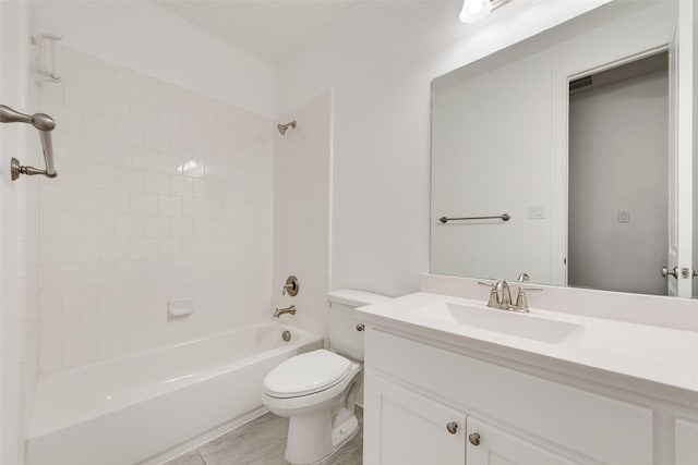 bathroom featuring shower / bath combination, visible vents, vanity, tile patterned floors, and toilet