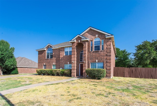1314 Kingsley Ct, Allen, TX 75013 - traditional-style house with brick siding, fence, and a front lawn