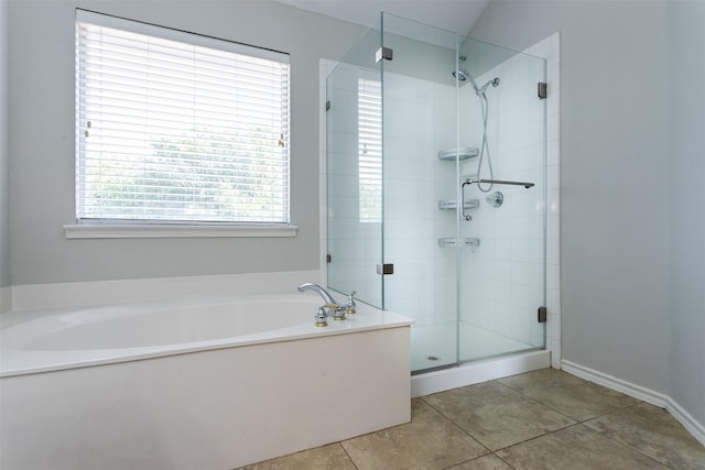 1314 Kingsley Ct, Allen, TX 75013 - full bathroom featuring a shower stall, a garden tub, baseboards, and tile patterned flooring