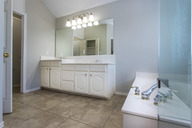1314 Kingsley Ct, Allen, TX 75013 - full bathroom with a garden tub, tile patterned flooring, vaulted ceiling, double vanity, and baseboards