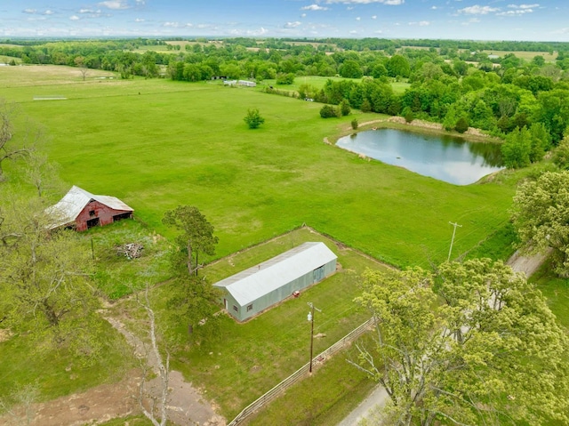aerial view with a rural view and a water view