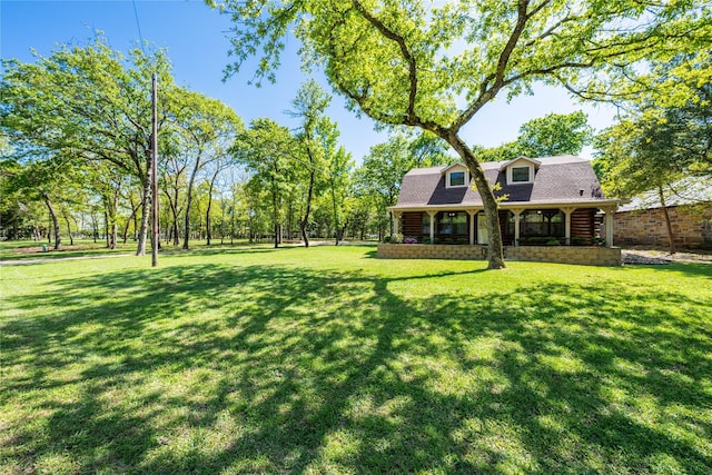 view of yard with a porch