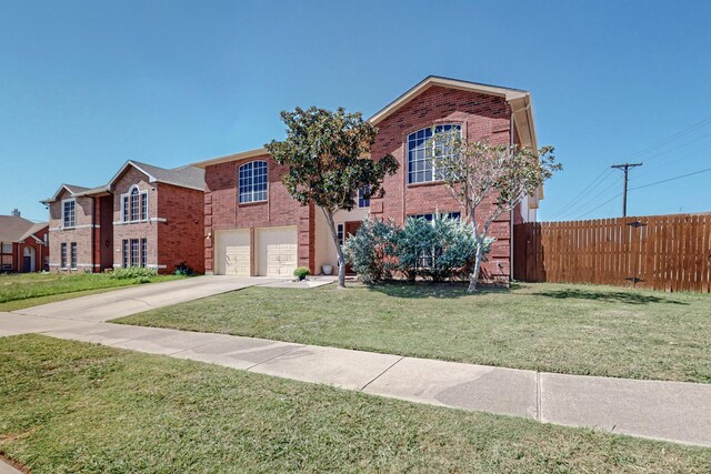 8202 Silverton Dr, Arlington, TX 76001 - view of front of house with concrete driveway, an attached garage, a front yard, brick siding, and fence