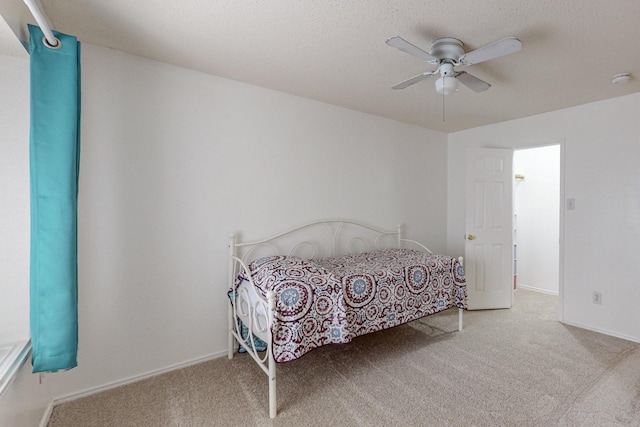 8202 Silverton Dr, Arlington, TX 76001 - carpeted bedroom with baseboards and a ceiling fan